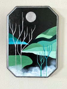 Frozen landscape on wood plaque in black green and silver